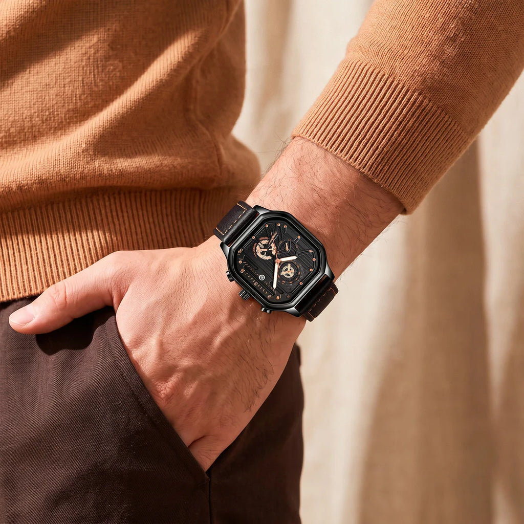 Sidney 42mm Preto e Dourado - no pulso com a mao no bolso